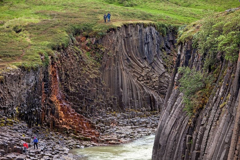 Studlagil gorge with basalt columns and glacial river Jokulsa a Bru