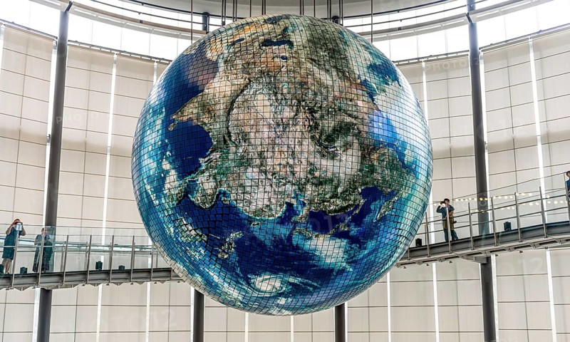 Big globe hangs from the ceiling