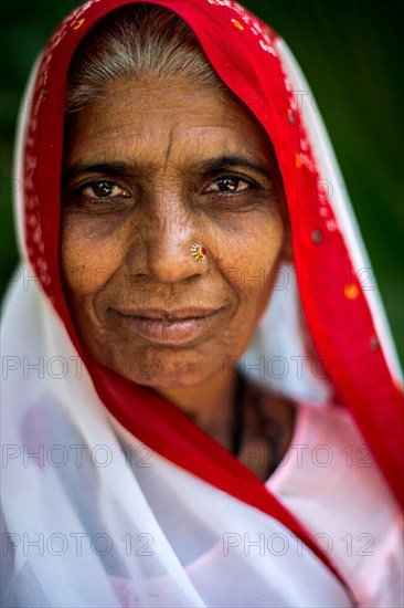 Portrait of local woman working in the Garden of the maidens
