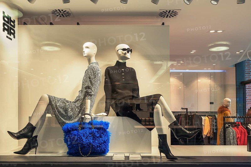 Shop window with fashion dolls