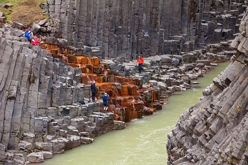 Studlagil gorge with basalt columns and glacial river Jokulsa a Bru