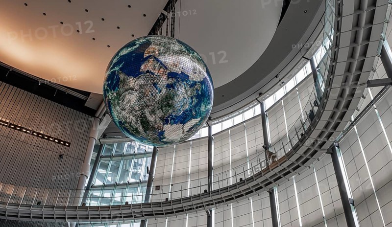 Big globe hangs from the ceiling