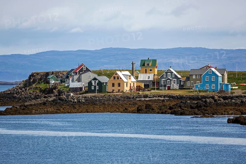 Colourful wooden houses on Flatey Island between Brjanslaekur and Stykkisholmur