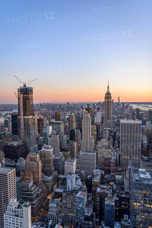 View of Midtown and Downtown Manhattan and Empire State Building from Top of the Rock Observation Center at sunset