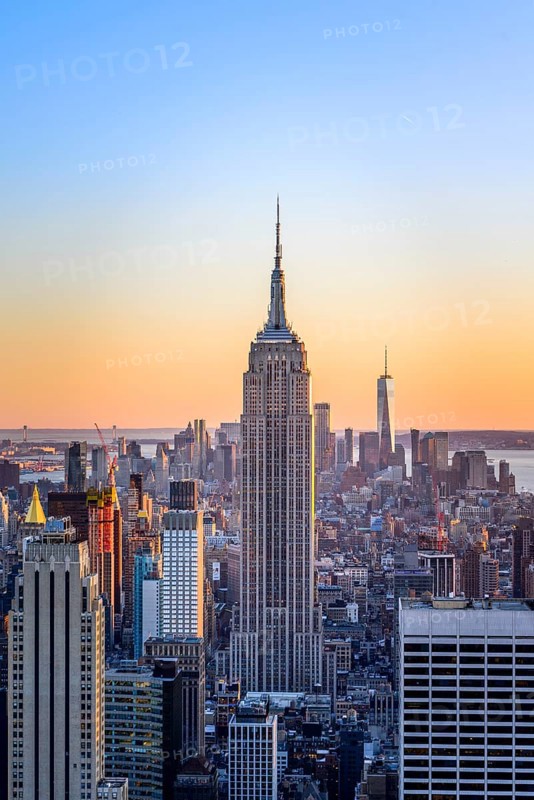 View of Midtown and Downtown Manhattan and Empire State Building from Top of the Rock Observation Center at sunset