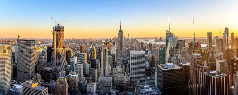 View of Midtown and Downtown Manhattan and Empire State Building from Top of the Rock Observation Center at sunset