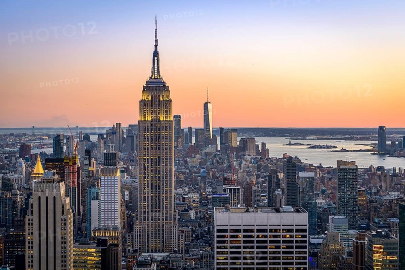 View of Midtown and Downtown Manhattan and Empire State Building from Top of the Rock Observation Center at sunset