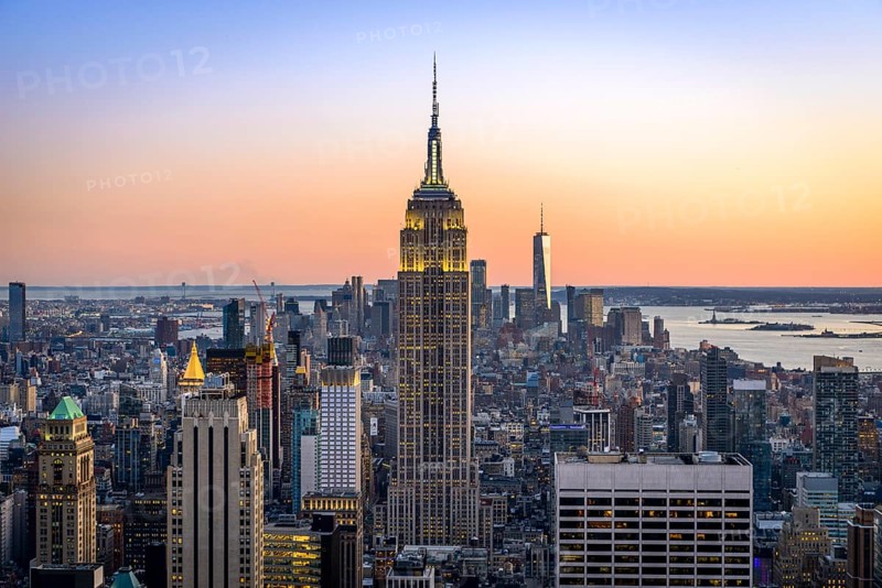 View of Midtown and Downtown Manhattan and Empire State Building from Top of the Rock Observation Center at sunset