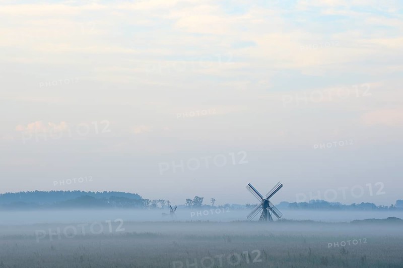 Small windmill with ground fog