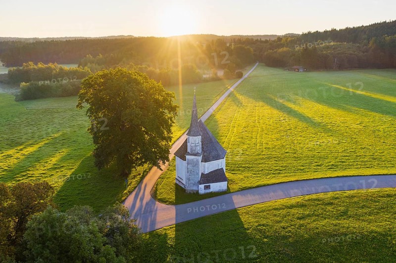 Chapel of St. Leonhard in Harmating at sunrise
