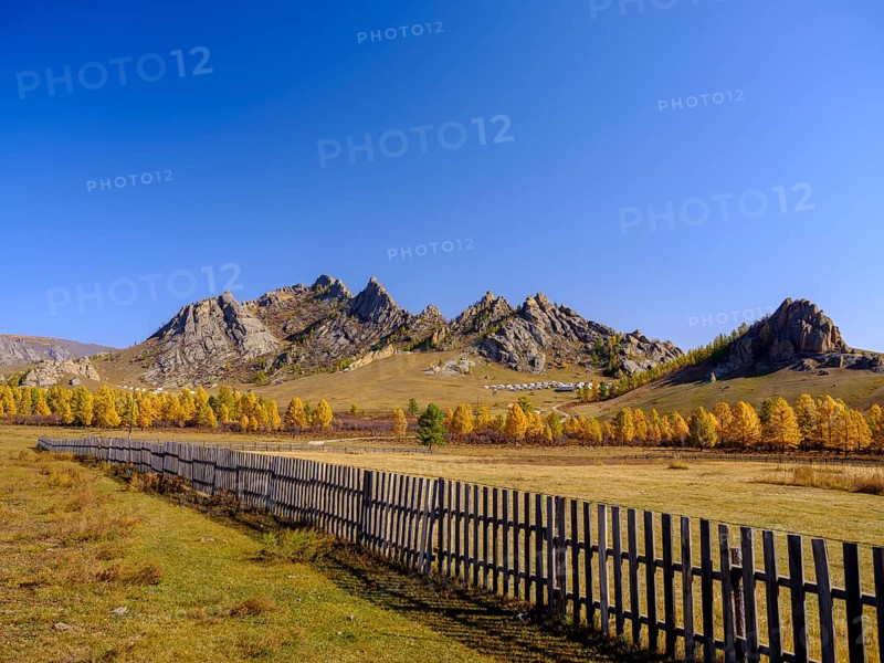 Autumnal colored trees and rocks in Gorky Terelj National Park