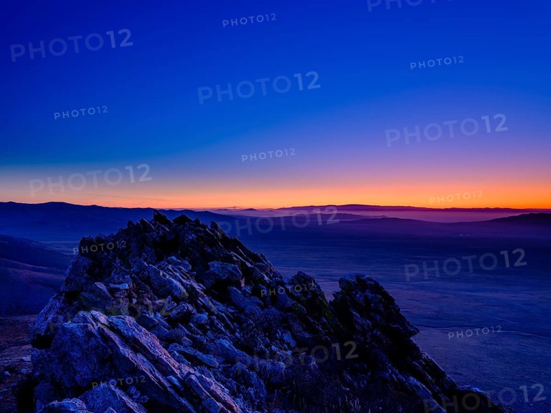 View from a summit to Mongolian steppe at blue hour