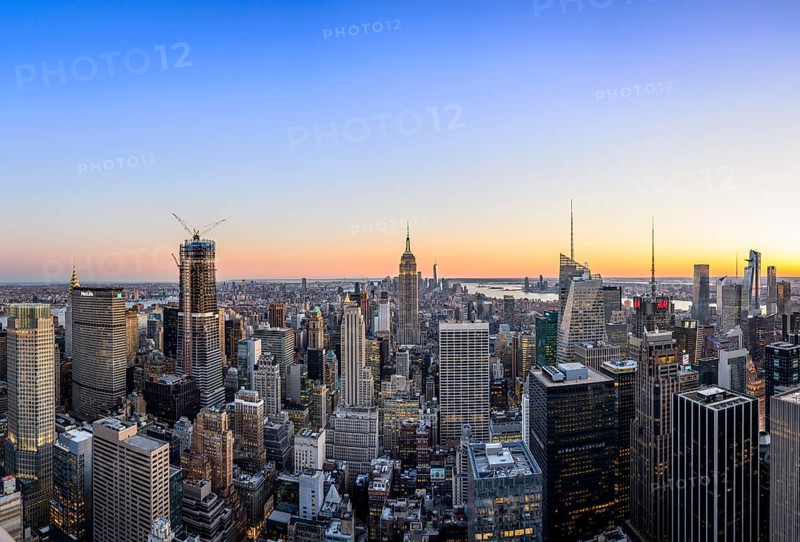 View of Midtown and Downtown Manhattan and Empire State Building from Top of the Rock Observation Center at sunset