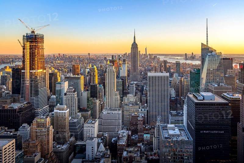 View of Midtown and Downtown Manhattan and Empire State Building from Top of the Rock Observation Center at sunset