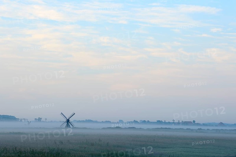 Small windmill with ground fog