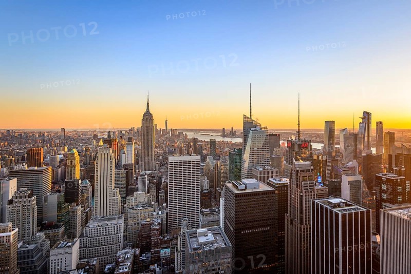 View of Midtown and Downtown Manhattan and Empire State Building from Top of the Rock Observation Center at sunset