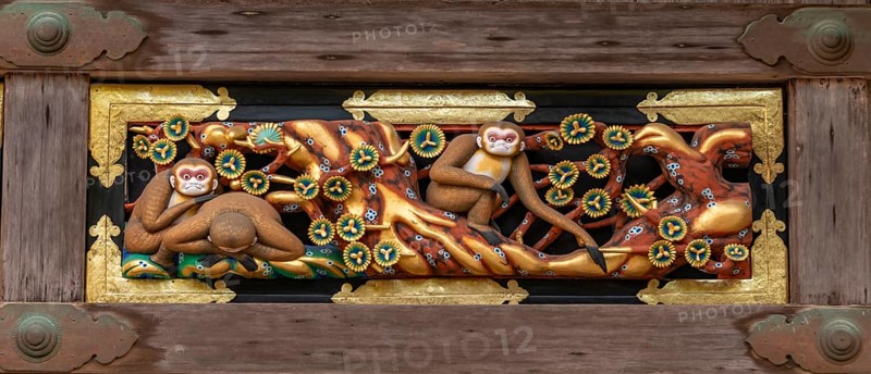 Carving of the three monkeys on the facade of the holy stable