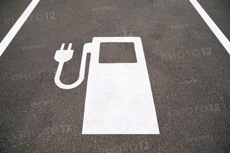 Symbol of an electric filling station on a parking lot
