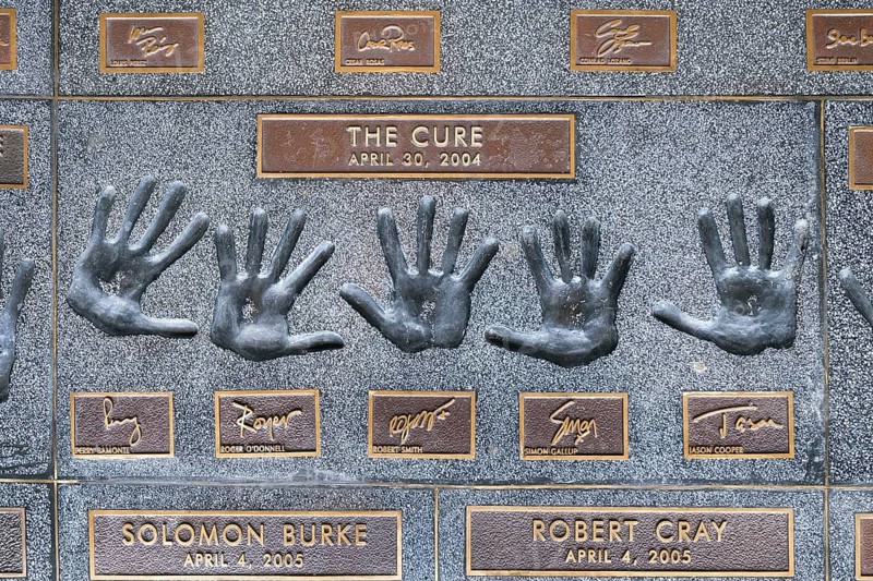 Hands of the band The Cure with Perry BamonteRoger O'Donnell