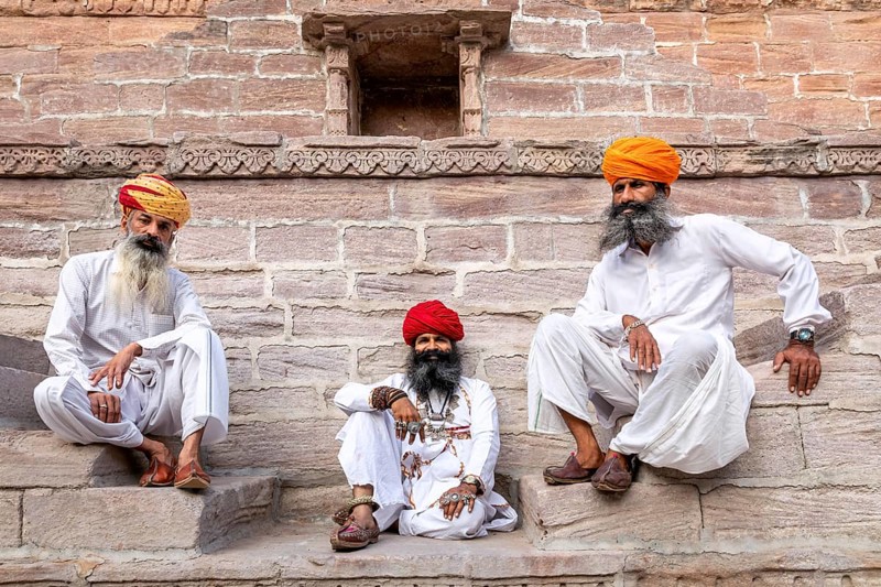Three men resting at the stepwell Toorji Ka Jhalra in Jodhpur