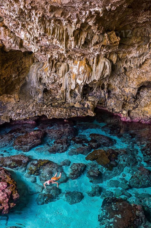 Tourist snorkeling in the Avaiki rock tide pools