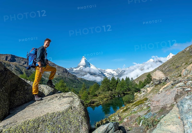 Hiker standing on rocks