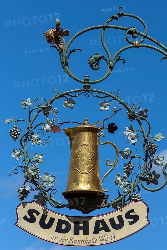 Hanging shop sign with golden beer mug