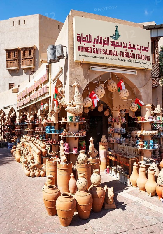 Clay jugs in front of souvenir shop
