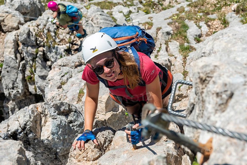 Young woman climbing