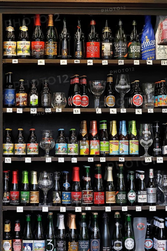 Shelf with assortment of Belgian beer in a beverage shop