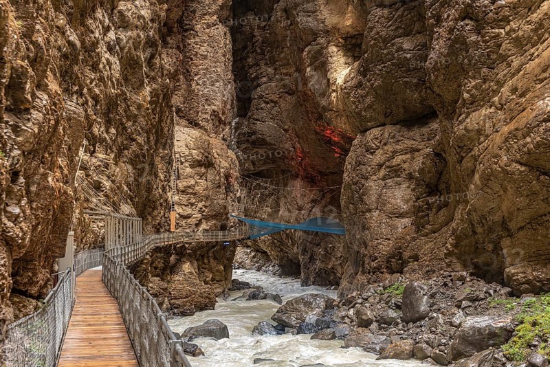 River Weisse Luetschine flows through Grindelwald glacier gorge