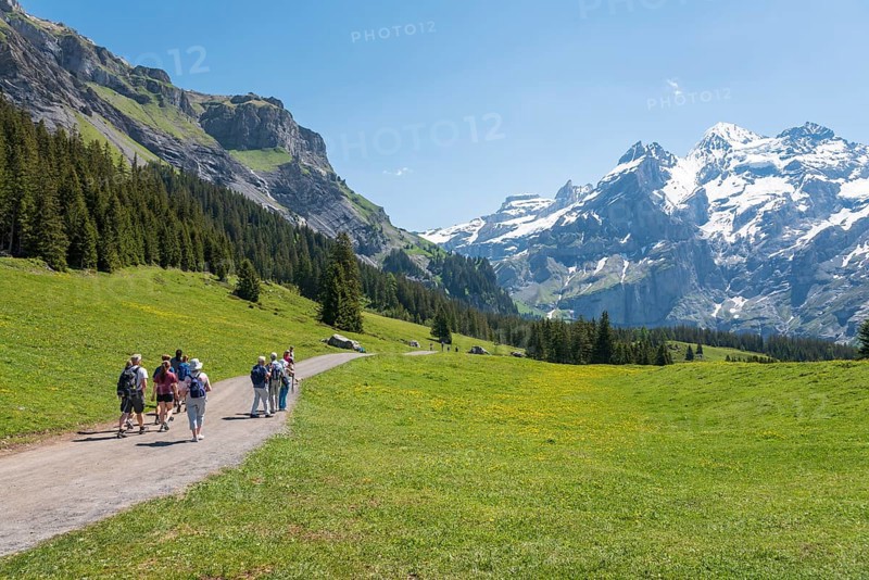 Hiker on the way to the Oeschinensee