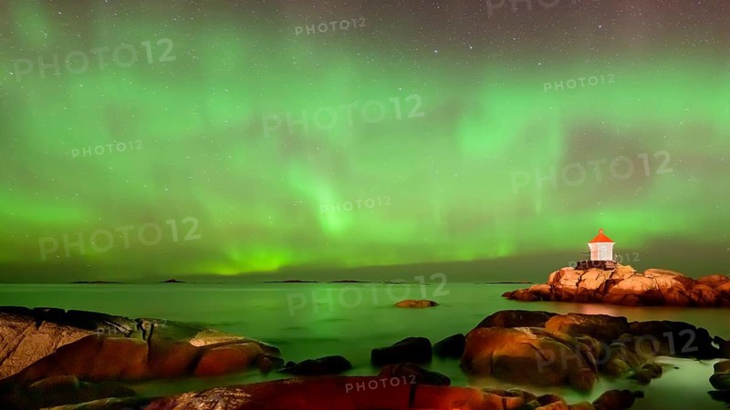 Northern Lights (Aurora borealis) above lighthouse