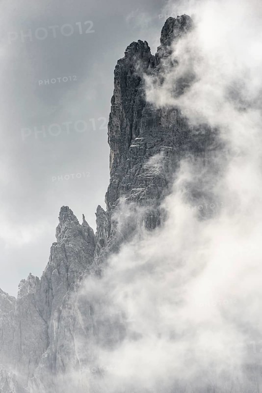 Bizarre mountain peaks with dramatic clouds
