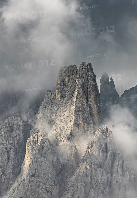 Bizarre mountain peaks with dramatic clouds