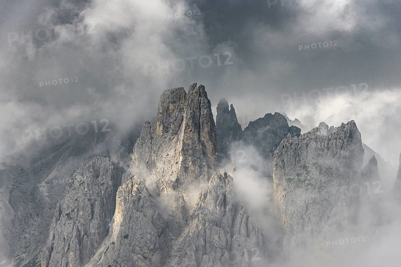 Bizarre mountain peaks with dramatic clouds