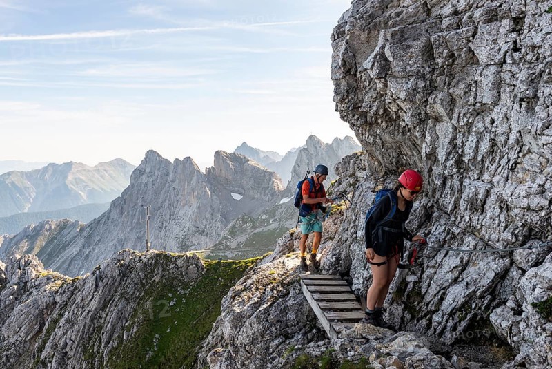Mountaineer on a secured fixed rope route