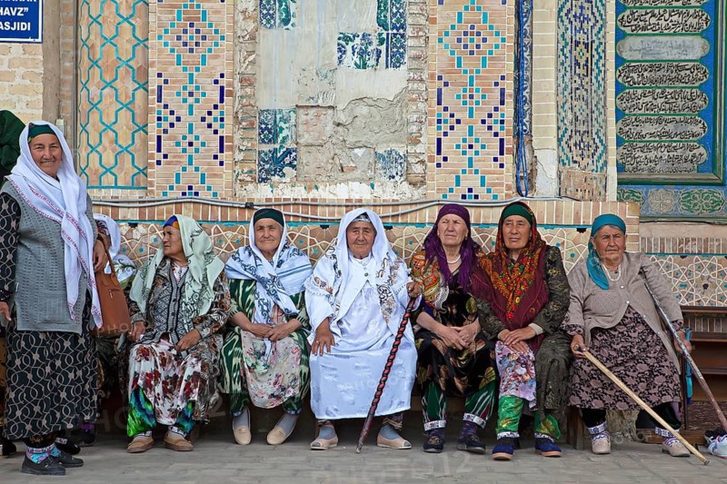 Visitors in traditional traditional traditional traditional traditional traditional traditional traditional traditional traditional costume at the Ivan of the Bolo Hovuz Mosque