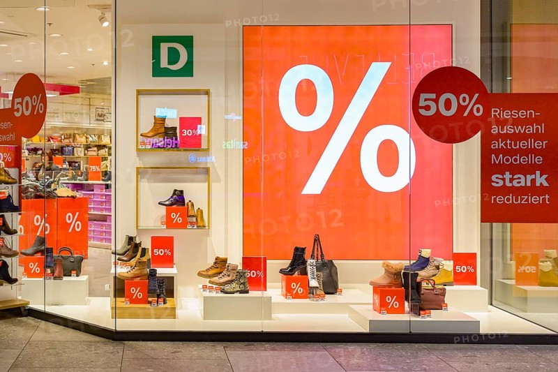 Shop window with large percent sign
