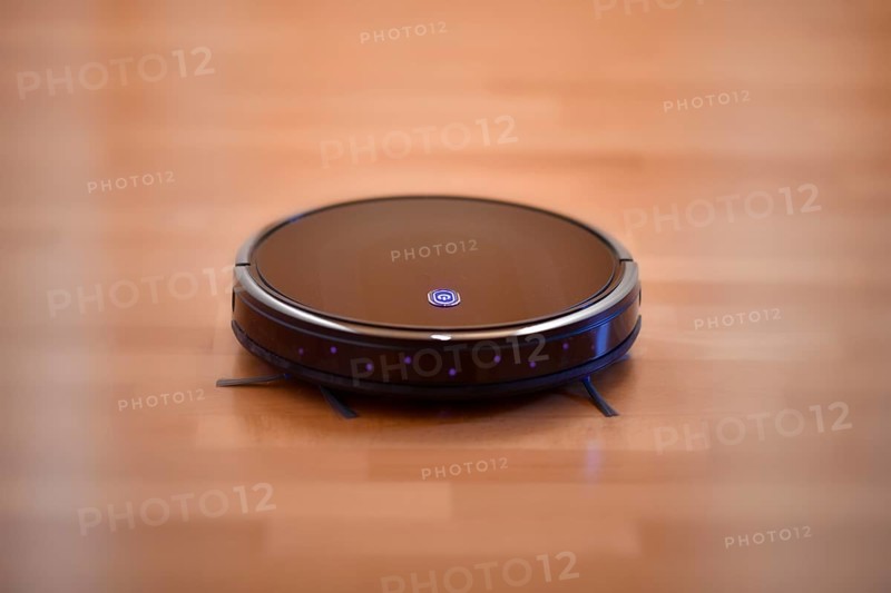 Suction robot on parquet floor