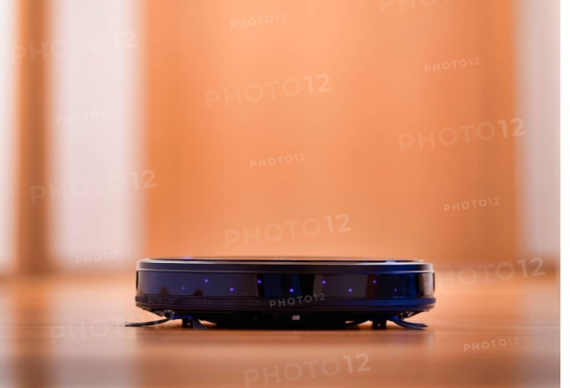 Suction robot on parquet floor