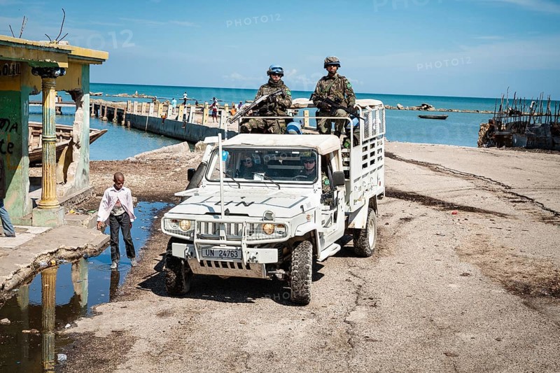 UN blue helmets in jeep on patrol