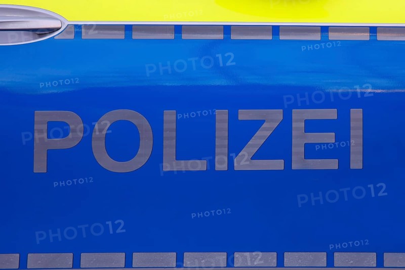 Police vehicle with police lettering on the side door