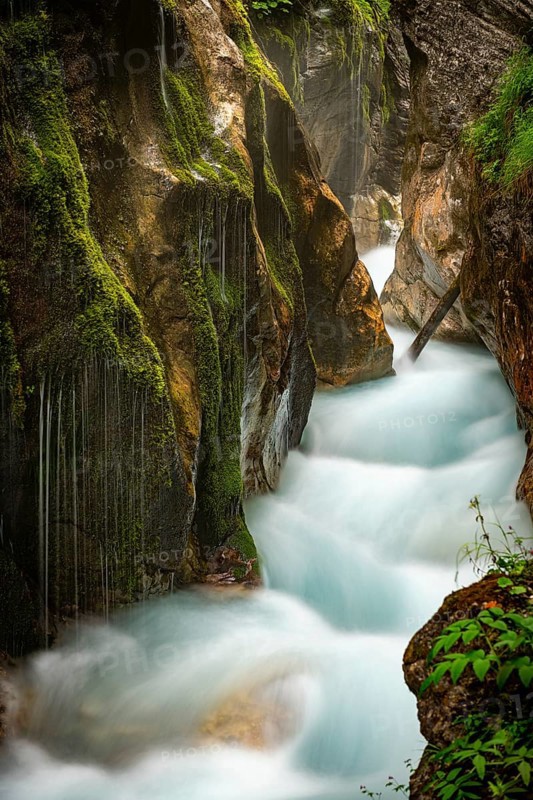 Small waterfalls with mountain stream