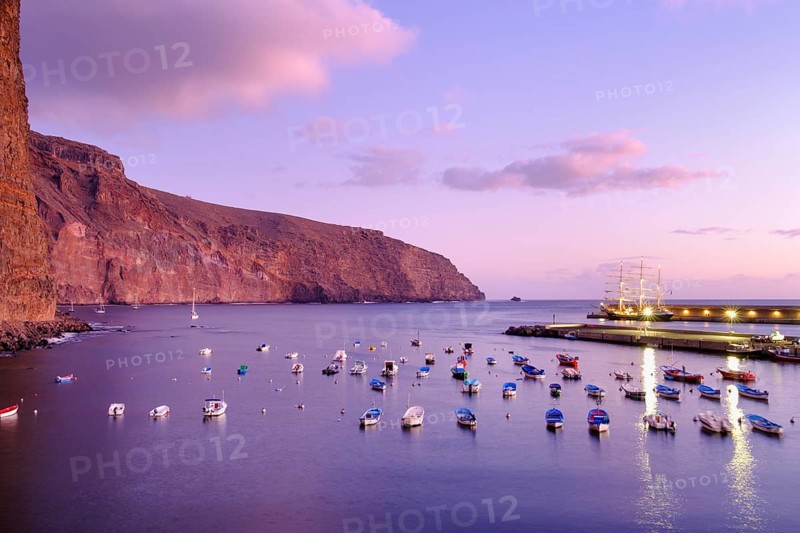 Fishing boats in the fishing port at dusk