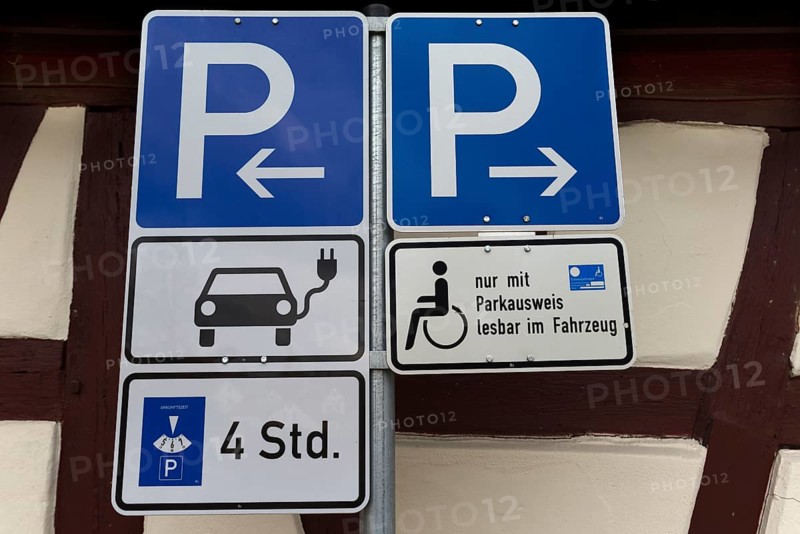 Parking signs for electric cars and disabled people