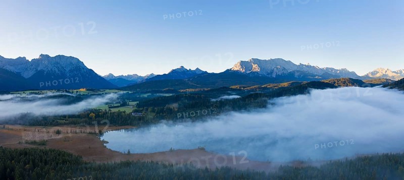 Wafts of mist over Barmsee near Kruen