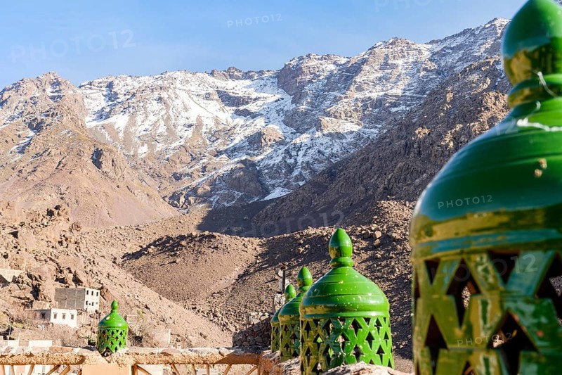 Moroccan green lanterns with Toubkal mountain range