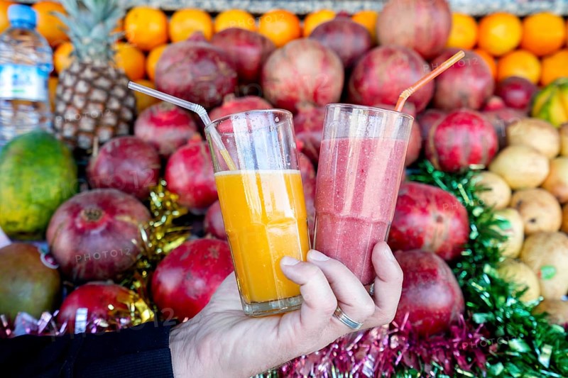 Mixed fruit juice and fresh orange juice