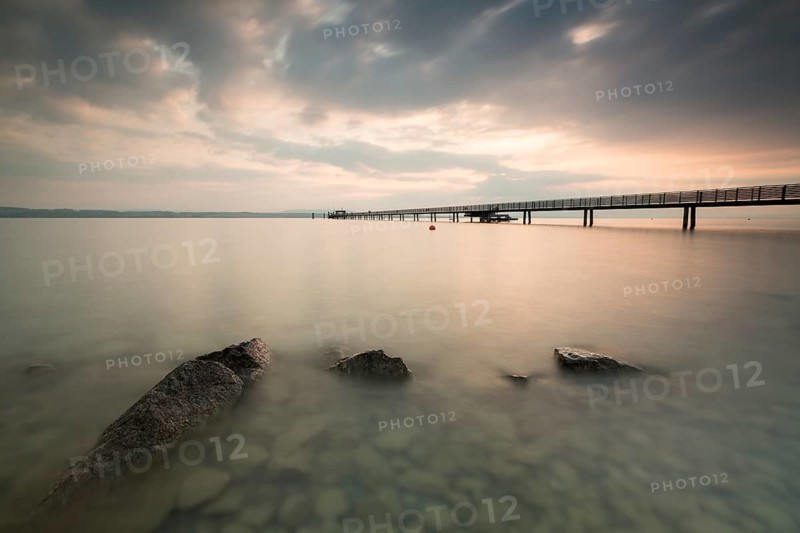 Longest jetty at Lake Constance in the morning light in Altnau